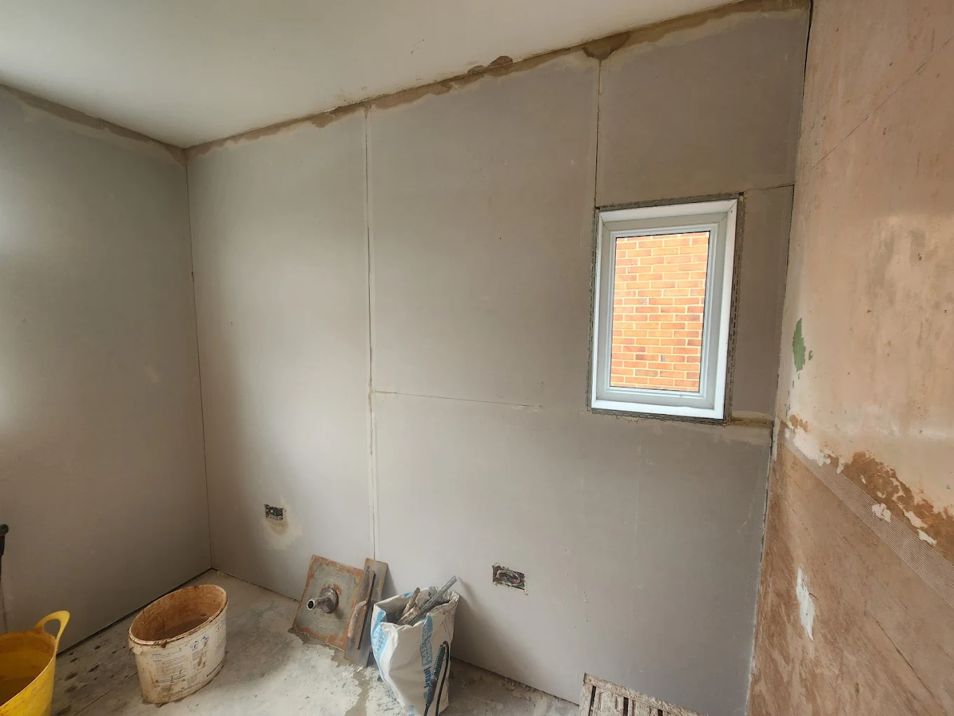Plasterboarded room ready for finishing